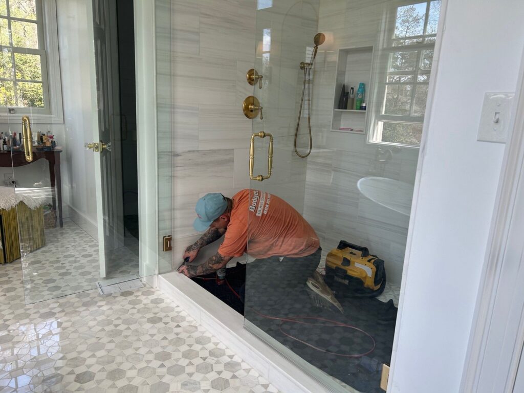 how much does shower glass replacement cost